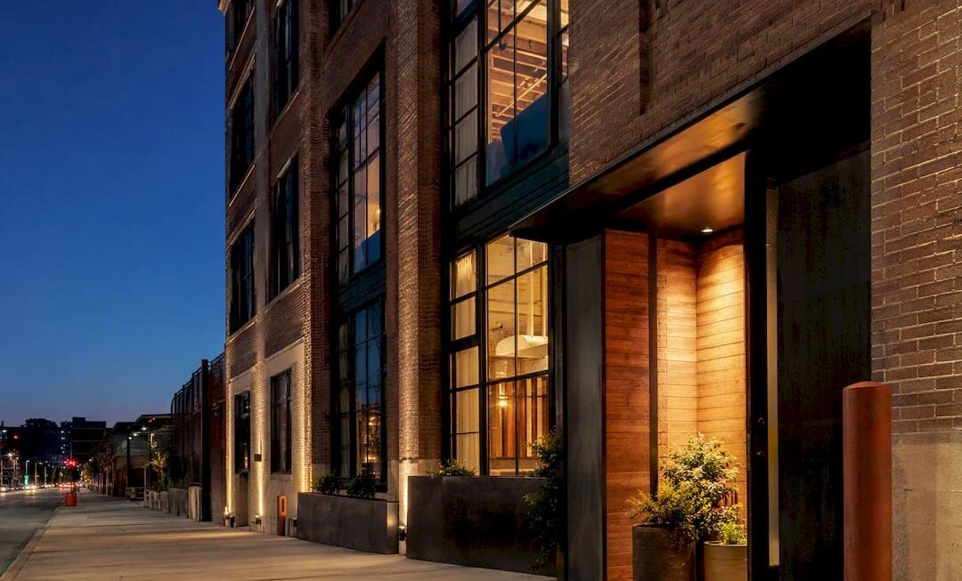 Converted Crossroads hotel exterior at dusk