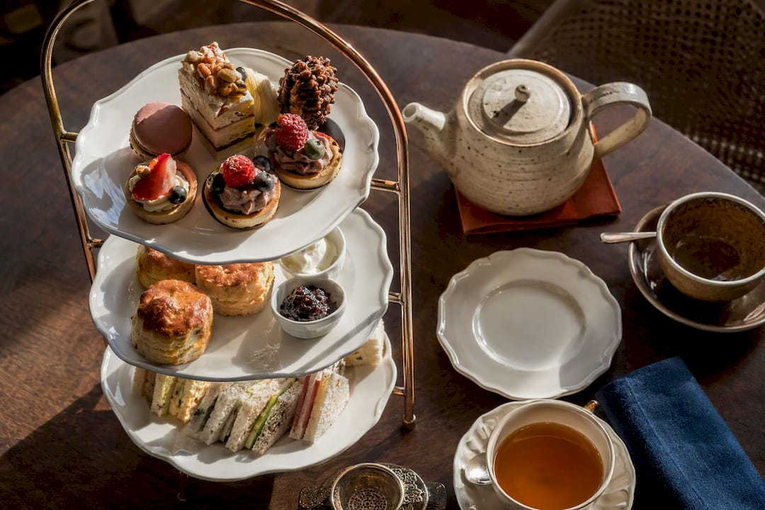 Tiered high tea stand with pastries