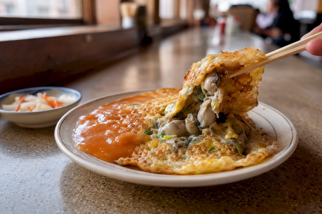 Taiwanese oyster omelet on ceramic plate