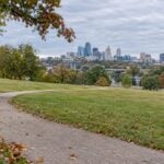 Penn Valley Park lawn with downtown beyond