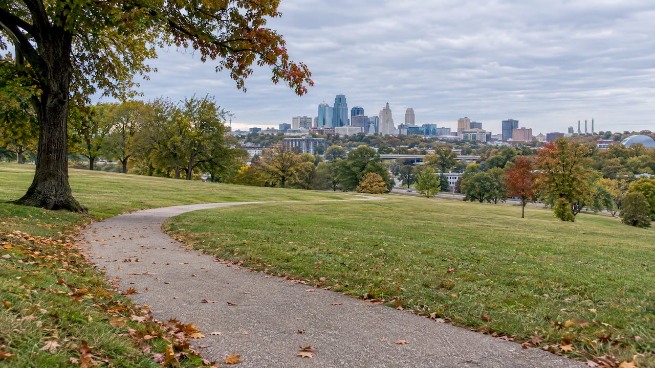 Penn Valley Park lawn with downtown beyond